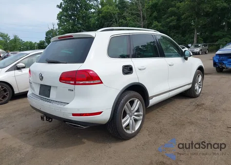 2014 Volkswagen Touareg Tdi Executive z USA, uszkodzony, nr VIN WVGEP9BP7ED001268